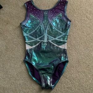 Metallic bejeweled gymnastics leotard